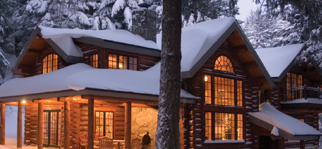 slider snowy log house